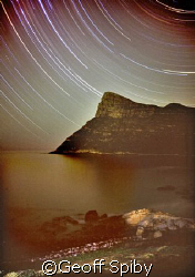 star trails across False Bay looking south towards Cape P... by Geoff Spiby 